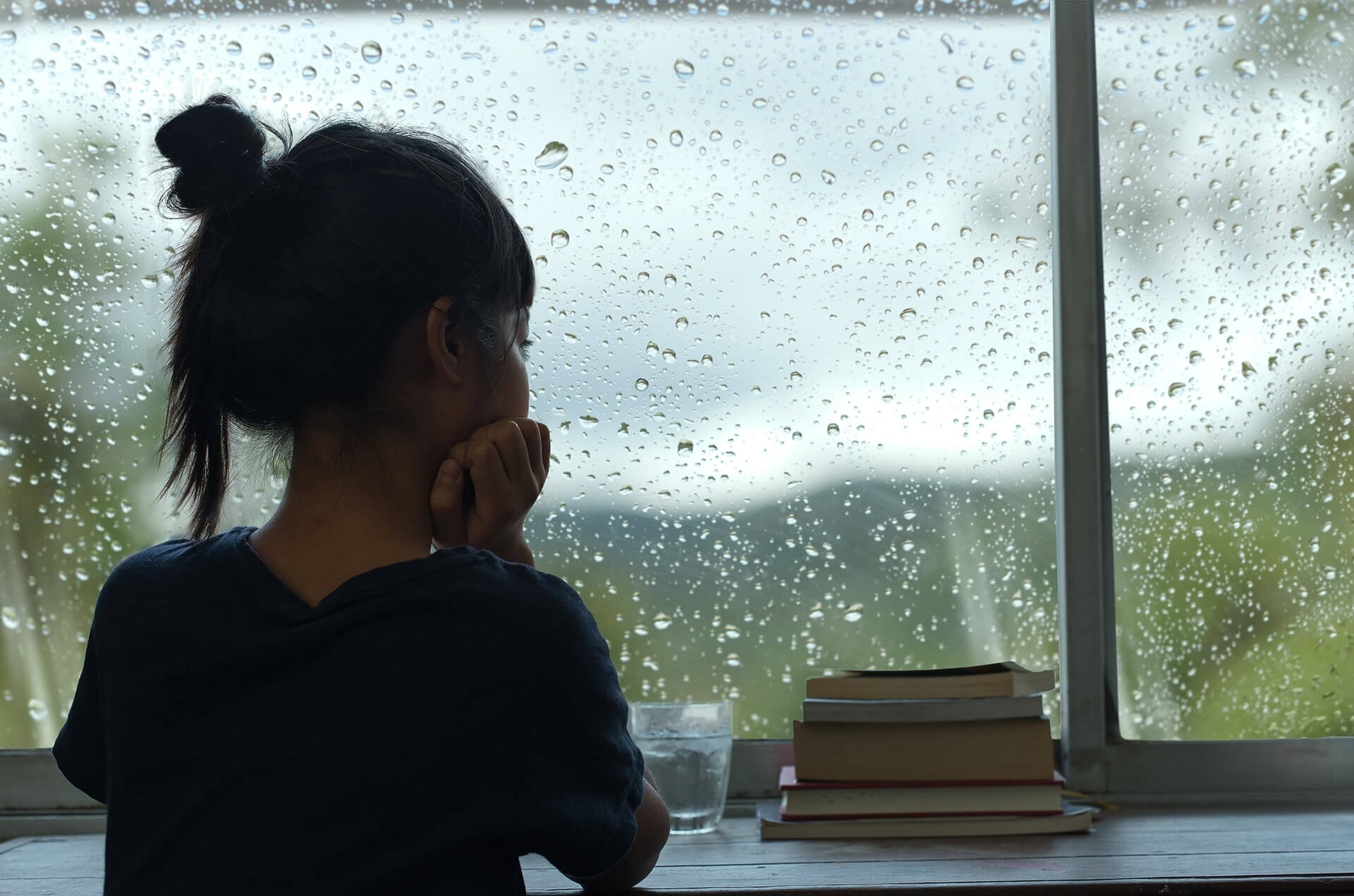 girl at the window - rainy day